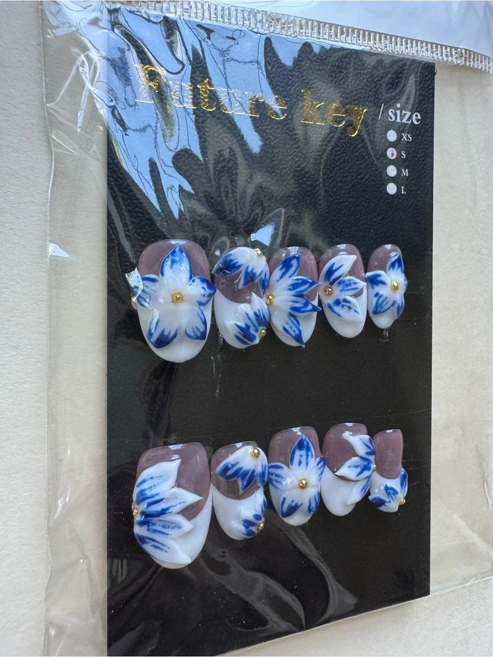 Future Key White French Tip Blue Floral Press-On Nails Oval